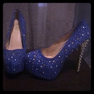 Slightly worn heels with studs! A steal !